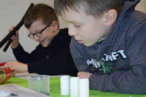 Children testing science activities at Letterbox Lab HQ.
