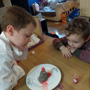 Claire shared this lovely photo of her little scientist teaching his little brother all about volcanoes using Explore Box 4: Gas Powered!